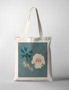 Canvas tote bag featuring a faith based poster design with a sheep and a teal vine against a muted blue background, conveying spiritual serenity and grace.