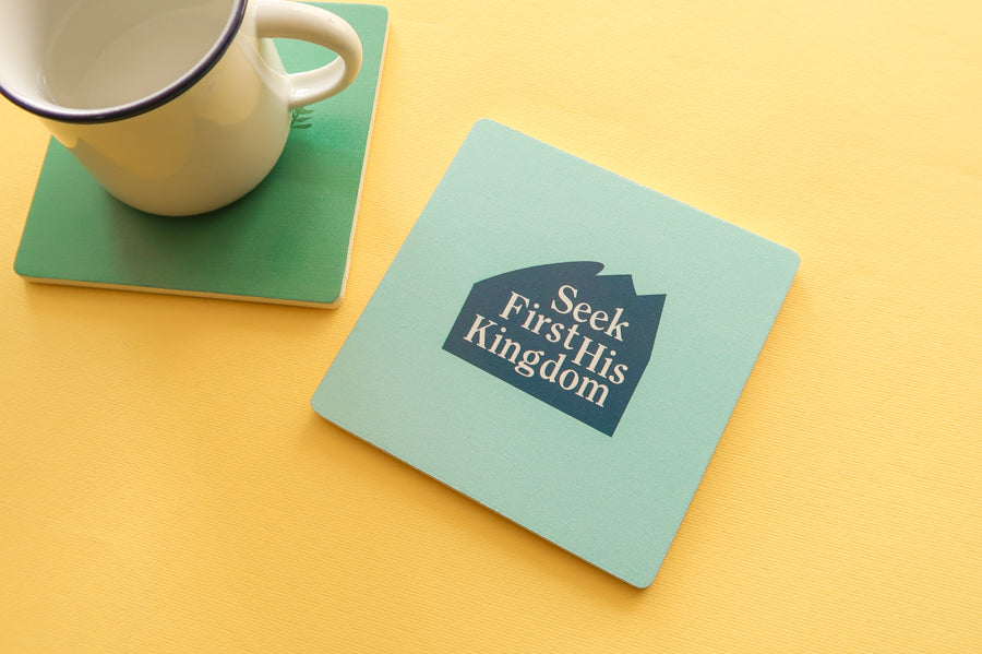 Contemporary Faith Coasters: Wooden squares with vibrant Christian designs, perfect gifts.