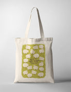 Stylish canvas tote bag with a vibrant design featuring an inspirational message, resembling a faith-based poster. The bag showcases many sheeps on a green pasture, evoking a sense of positivity and spiritual encouragement. Ideal for carrying personal items while expressing faith through a visually appealing accessory
