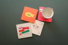 Sacred Symbol Coaster: Wooden square coaster set featuring vibrant Christian designs.