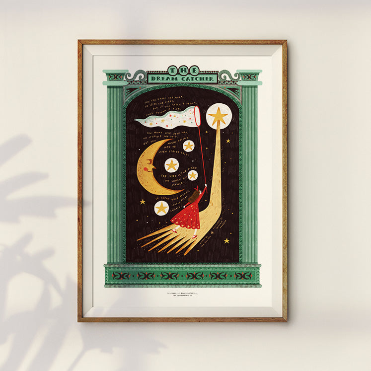 Decorative art print in a wooden frame, showcasing a whimsical scene of a girl reaching for stars with the title 'The Dream Catcher' above.