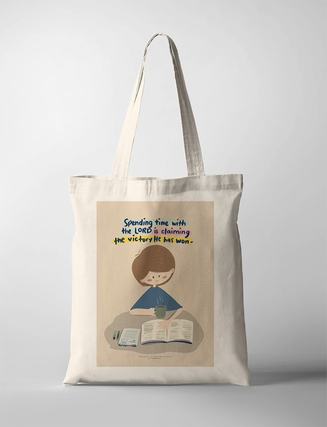 Christian faith based poster showing a peaceful boy with brown hair, sipping from a mug while reading an open Bible. Surrounded by a notebook and highlighters on a beige tabletop, he is immersed in quiet devotion. The quote above him says, “Spending time with the LORD is claiming the victory He has won,” rendered in a colorful, playful font. Ideal for those seeking spiritual encouragement in their daily walk.