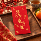 Abundance Year After Year Christian Lunar New Year red packet styled in a festive home setting.