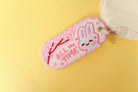 Adorable pink keychain featuring a cheerful white bunny and the words 'ALL the TIME'.