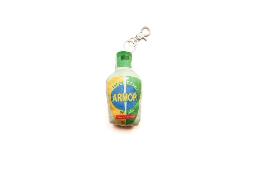 Armor of God Hand Sanitizer plushie keychain with green bottle-inspired design and clip.