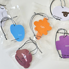 Assorted Christian heart scent tags in colorful shapes with uplifting words like "Love," "Light," "Peace," and "Jesus," perfect for sharing encouragement and simple happiness.