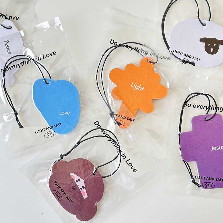 Assorted Christian heart scent tags in colorful shapes with uplifting words like "Love," "Light," "Peace," and "Jesus," perfect for sharing encouragement and simple happiness.