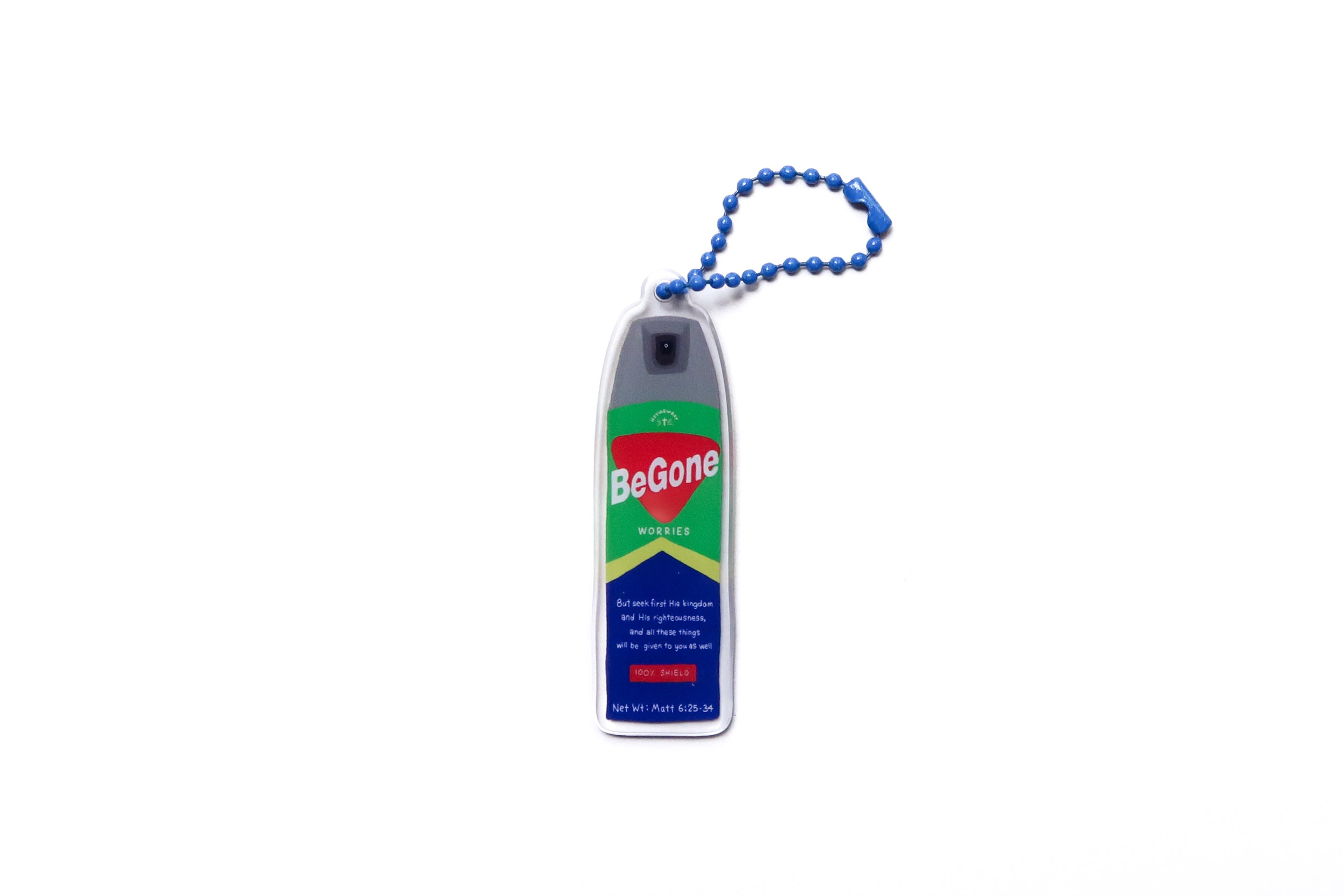 BeGone Worries acrylic keychain designed like an insect repellent spray bottle, featuring Matthew 6:25–34, with a blue beaded chain against a white background.