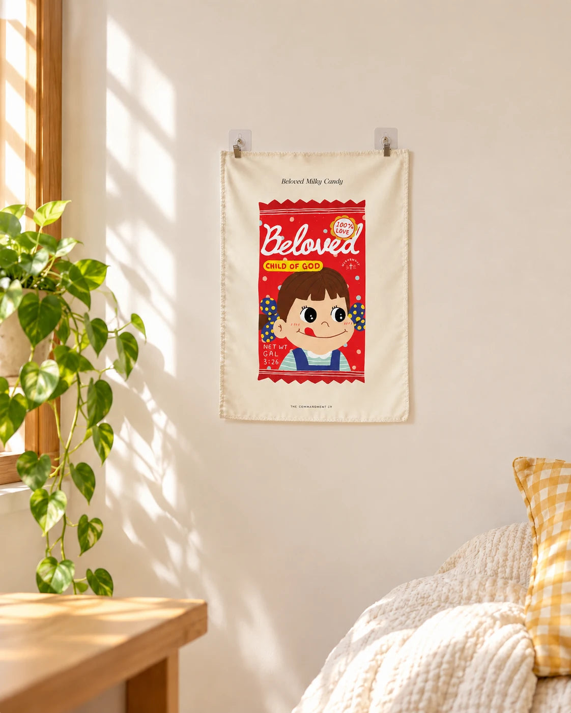 Beloved Child of God milky candy small wall tapestry hanging in a warm sunlit home interior