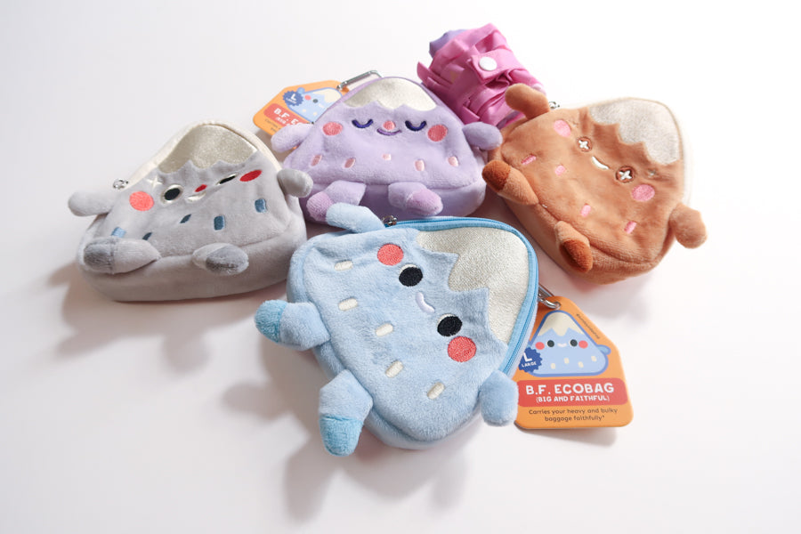 BF Eco Bag plush pouches in Everest blue, Moriah purple, Carmel brown, and Rocky gray designs, cute foldable Christian reusable bag accessories.