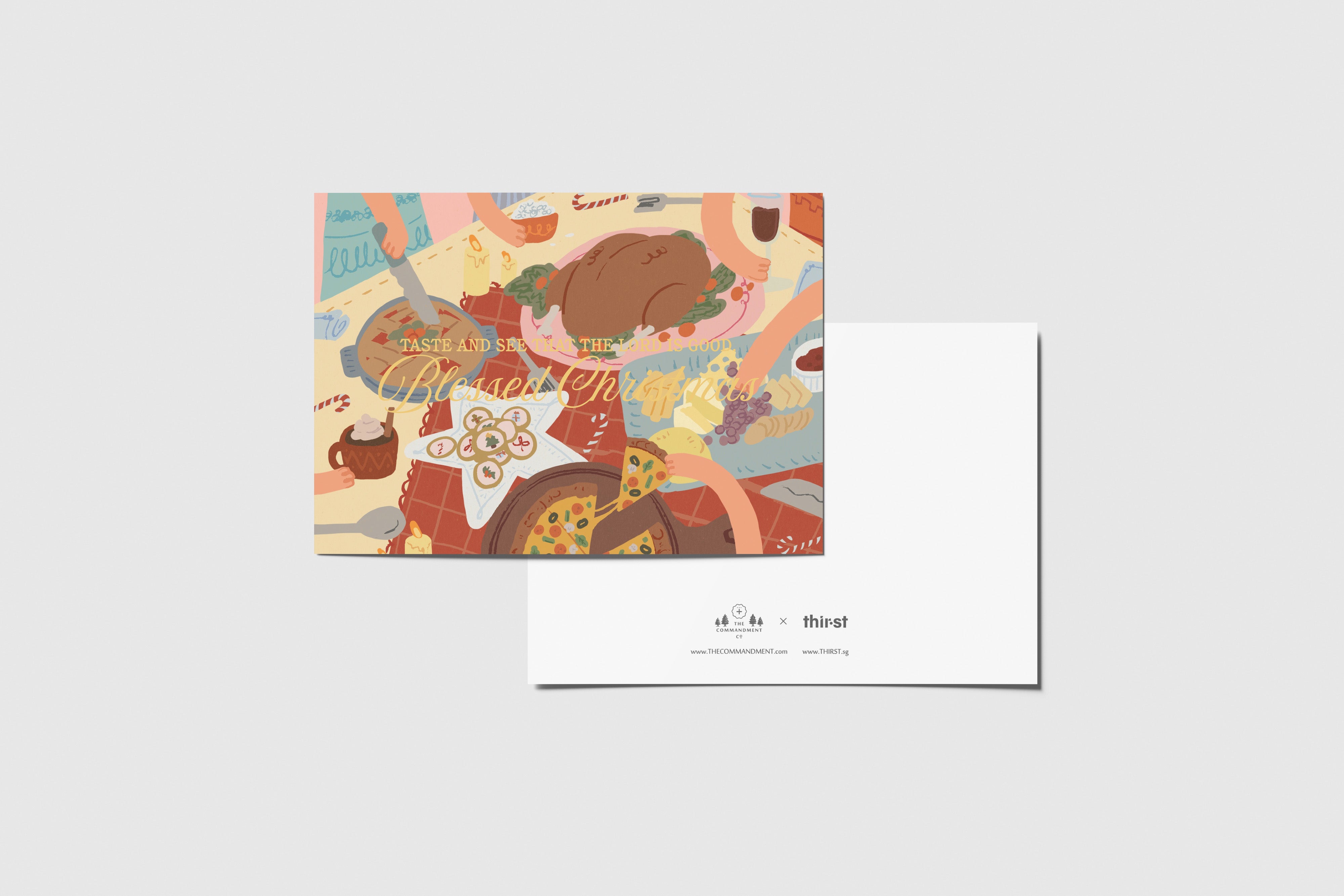 Blessed Christmas postcard with festive feast illustration and “Taste and see that the Lord is good” message, designed by Thir.st in collaboration with The Commandment Co.