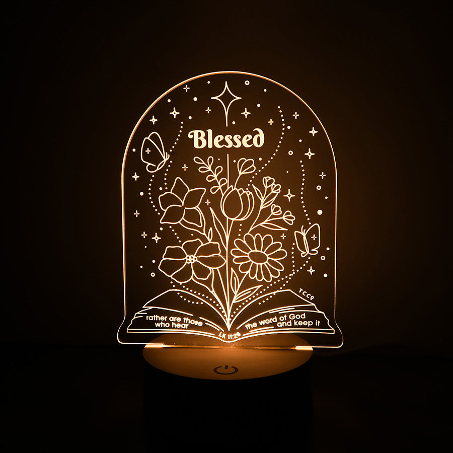 Christian inspirational lamp featuring 'Blessed' and Bible verse Luke 11:28, with floral designs and butterflies.