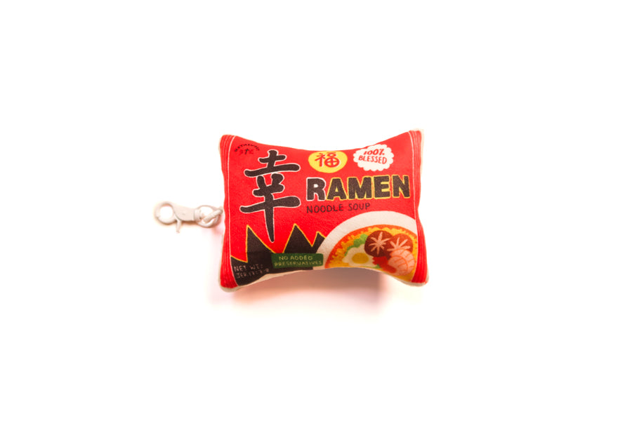 Blessed Ramen plushie keychain with red ramen packet design and clip