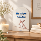 By His Stripes We Are Healed 3D wooden poster with Jesus carrying the cross in a warm home setting.