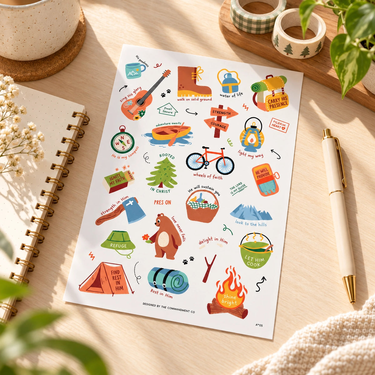 Camp Everyday Christian sticker sheet styled on a bright wooden desk with notebook, pen, washi tape and warm natural light