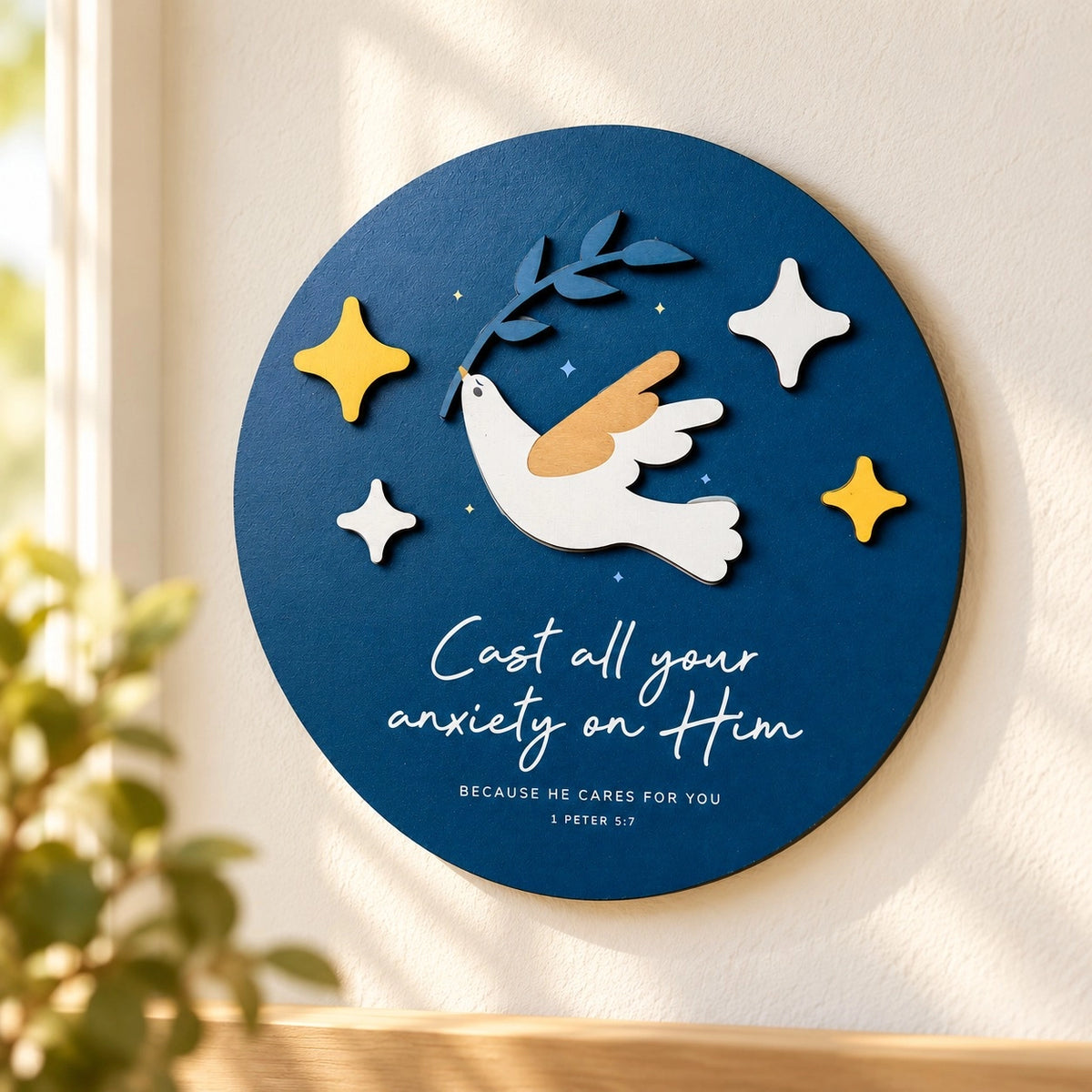 Cast All Your Anxiety on Him 3D dove poster featuring 1 Peter 5:7 on a bright cream wall.