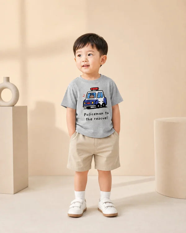 Child wearing the grey Policeman to the Rescue kids T-shirt with police car design
