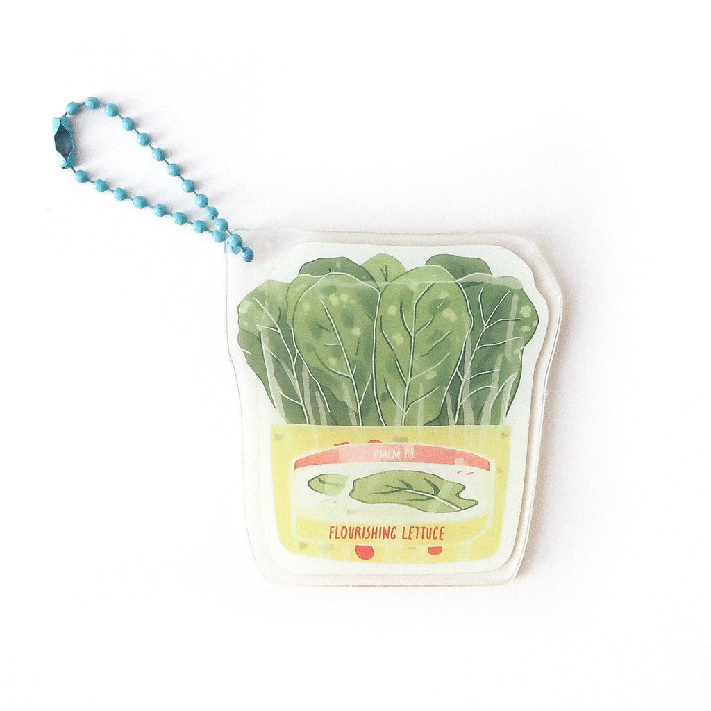 Keychain featuring vibrant green lettuce with the phrase ‘Flourishing Lettuce,’ symbolizing growth and faith-inspired living.