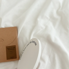 Side view of Christian ceramic coaster 