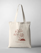 Natural canvas Christian tote bag featuring a joyful bear illustration and The Greatest of These Is Love from 1 Corinthians 13:13.