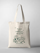 Natural canvas Christian tote bag with a bear walking across stepping stones and the words My Steps Are Ordered by the Lord.