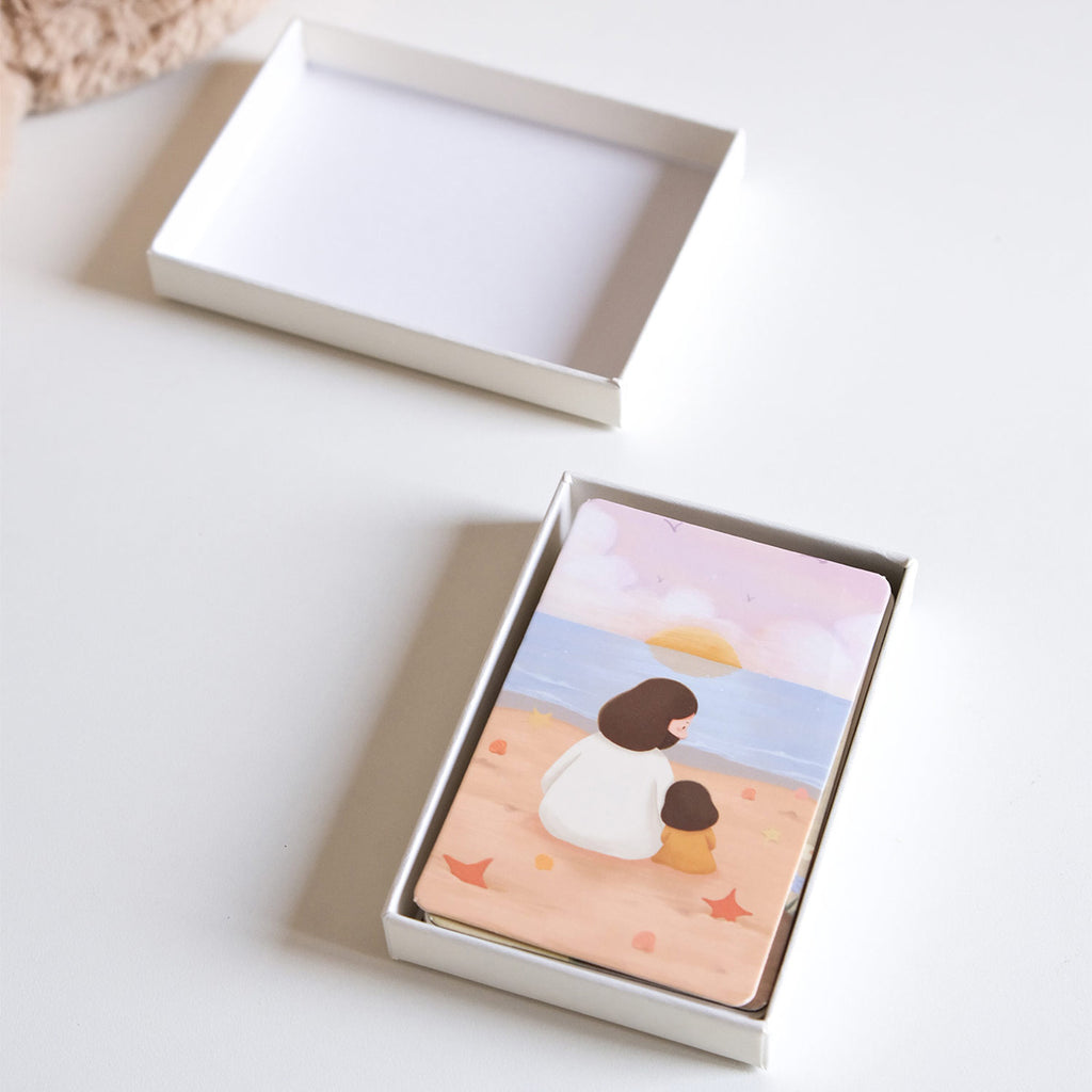 Boxed Christian mini card set featuring an inspirational illustration of Jesus and a child sitting on a beach, designed for faith and devotion