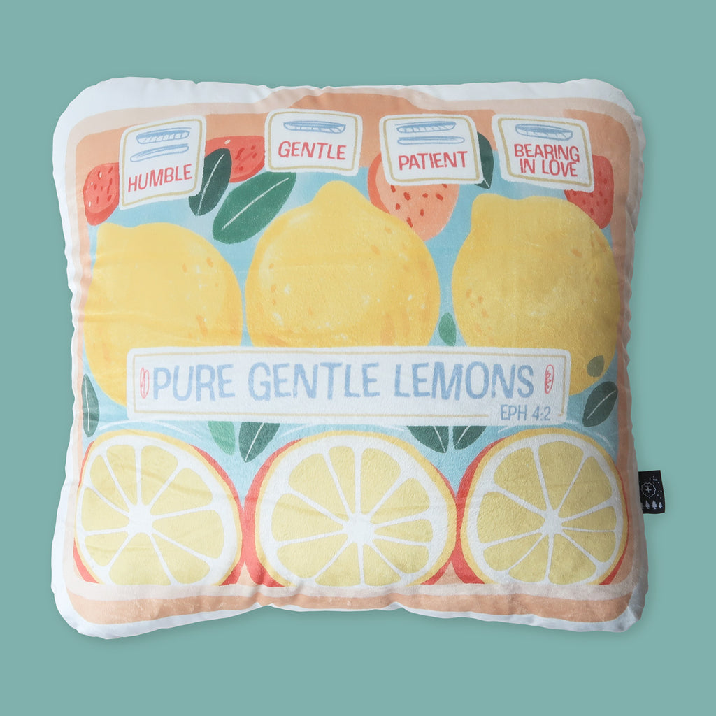 Christian plush pillow featuring 'Pure Gentle Lemons' design with Ephesians 4:2 theme, emphasizing gentleness, patience, and love.