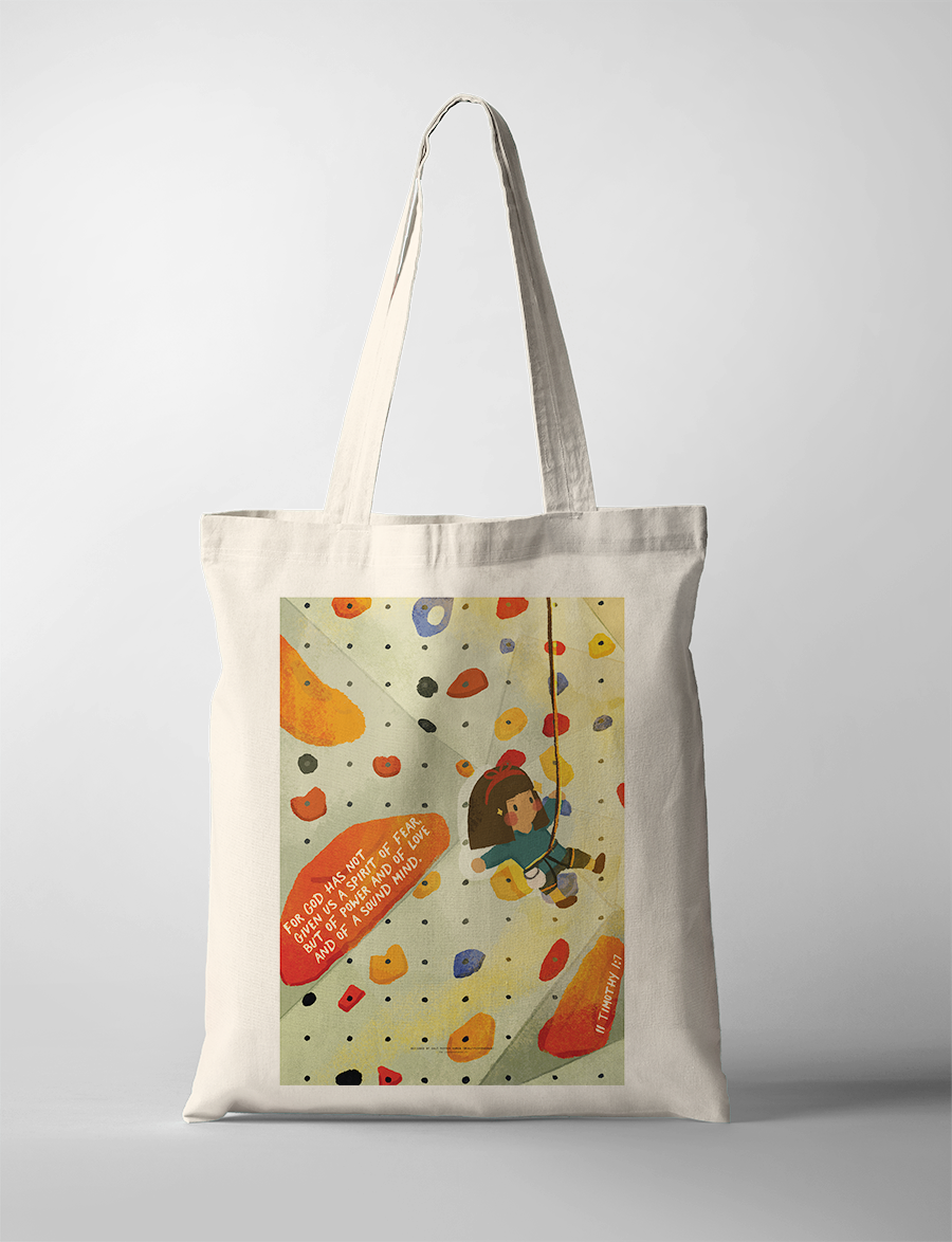 Christian tote bag featuring a cheerful girl rock climbing on a colorful wall, with the encouraging Bible verse "For God has not given us a spirit of fear, but of power and of love and of a sound mind" from 2 Timothy 1:7, inspiring courage and simple happiness.