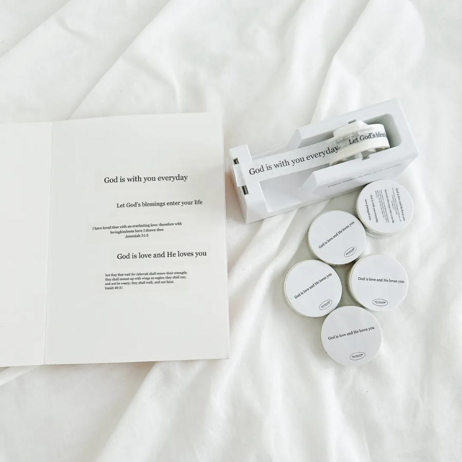 Christian washi tape set with uplifting messages like "God is with you everyday" and "God is love and He loves you," displayed with a tape dispenser and inspirational card, perfect for faith-filled journaling.