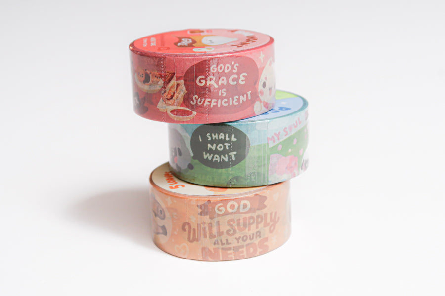 Stacked Christian washi tapes showing Psalm 23, Abundant Grace, and 5 Loaves 2 Fish designs with colorful Bible-inspired artwork.