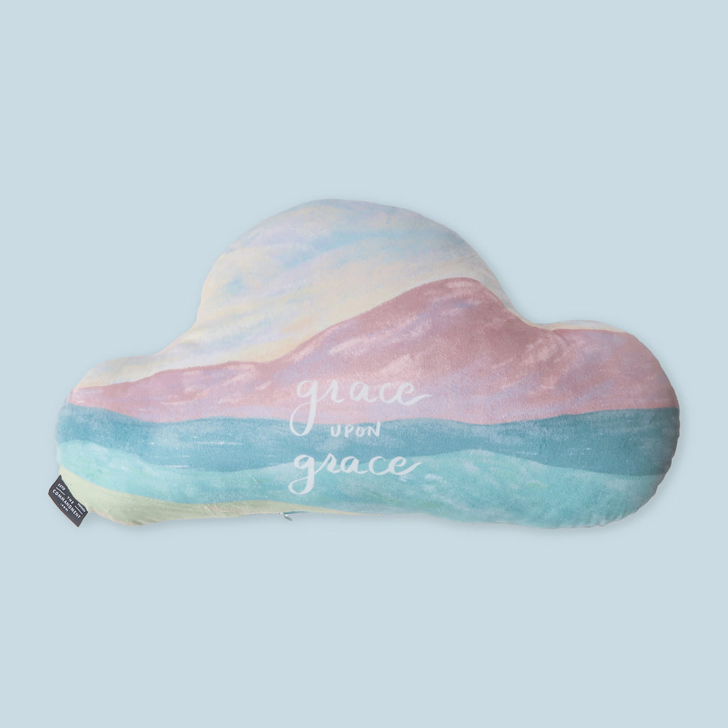 Soft pastel Christian plush pillow in the shape of a cloud, displaying the message 'grace upon grace' for a gentle, uplifting touch.