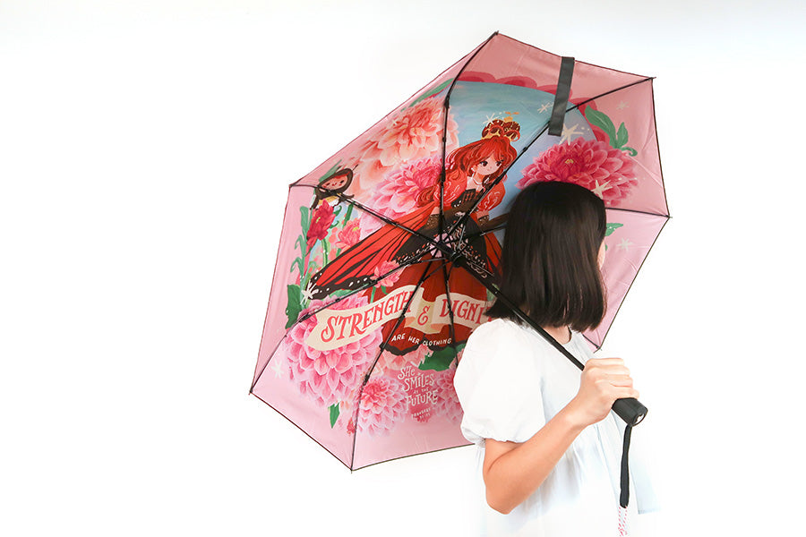 Christian umbrella with 'Strength and Dignity' verse and vibrant floral design, ideal for spiritual inspiration.