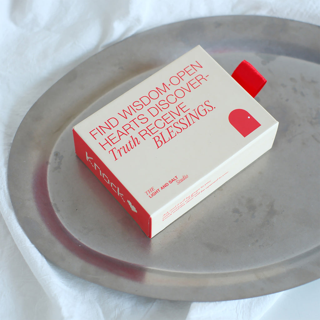 Conversation card set box with red text reading 'Find Wisdom, Open Hearts, Discover Truth, Receive Blessings'