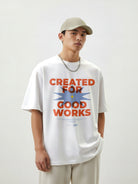 Male model wearing the “Created for Good Works” Christian t-shirt, a faith-based design created in collaboration with YWAM for the Creative Identity Conference.
