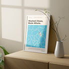 Customisable baptism poster with "Washed Clean, Made Whole" message, elegantly placed with a vase, a perfect baptism gift from The Commandment Co, Singapore's Christian gifts store.