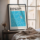 Customisable baptism poster with "Washed Clean, Made Whole" message, displayed by a window, a meaningful baptism gift from The Commandment Co, Singapore's Christian gifts store.