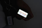Daily Grace lightbox keychain inspired by 2 Corinthians 12:9 glowing in the dark