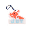 Acrylic keychain featuring a dragon mosaic design with the word "Joy," from The Commandment Co, Singapore.