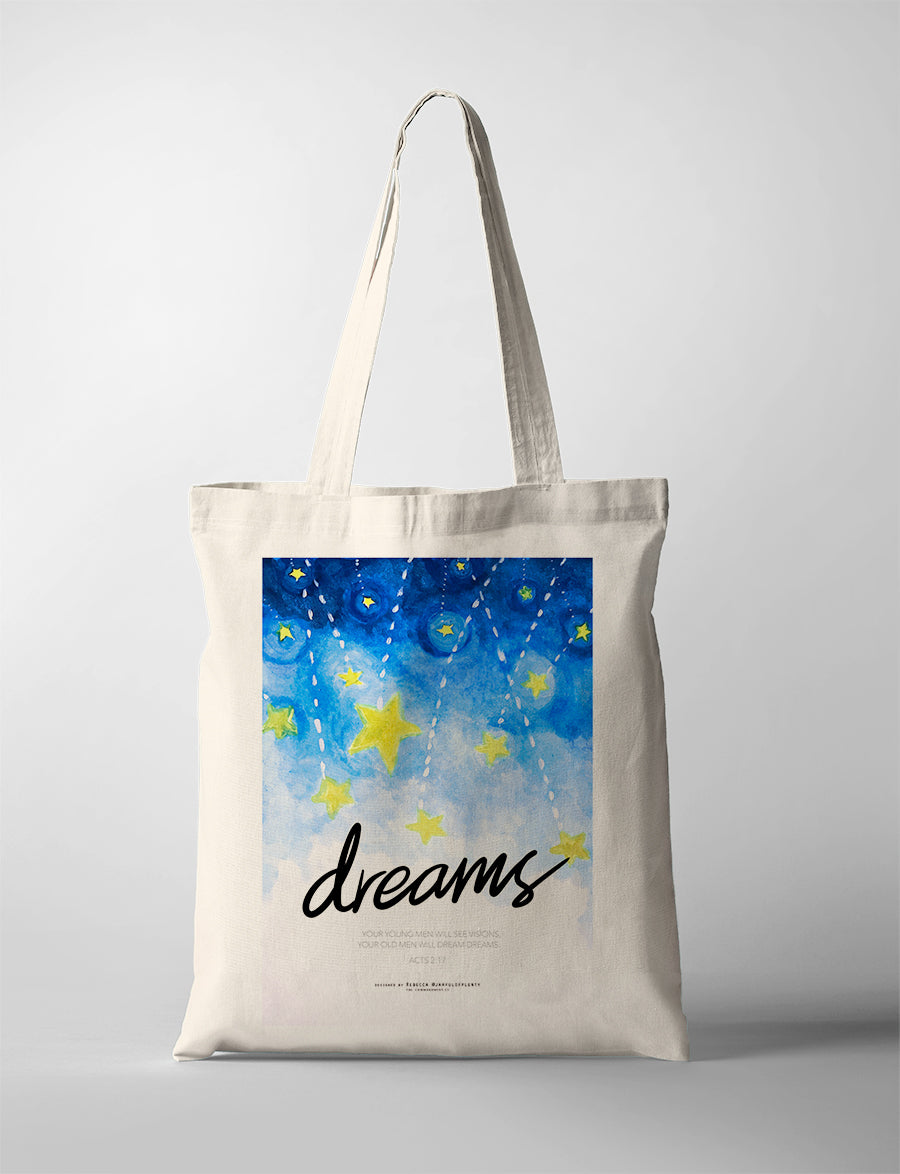 Faith-based tote bag with blue sky and yellow star artwork inspired by Acts 2:17 — your young men will see visions, your old men will dream dreams.