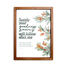 A wooden-framed wall art featuring the scripture "Surely your goodness and mercy will follow after me" from Psalm 23:6, accompanied by delicate illustrations of green leaves and orange berries, perfect for Christian-inspired home decoration.