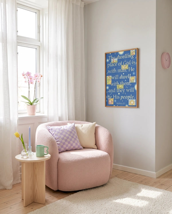 Dwelling Place of God blue Revelation 21:3 Christian poster displayed in a bright reading corner with a pink chair and orchid
