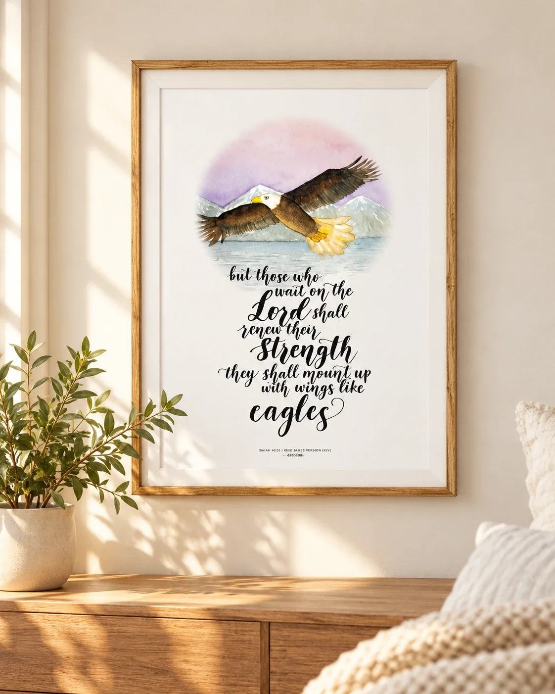 Framed Eagle poster displayed in sunlit neutral living room