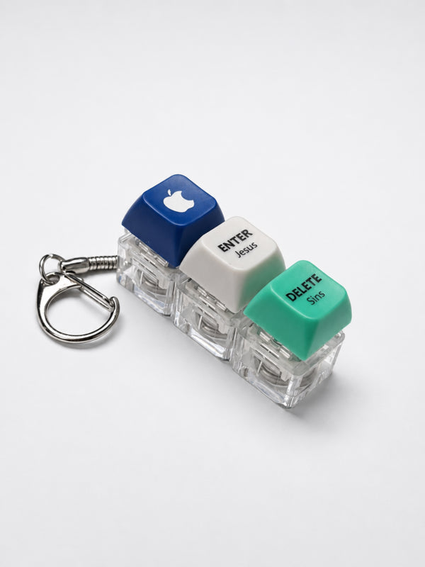 Enter Jesus Delete Sins triple light-up keycap keychain in blue, white and green on a white background