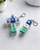 Enter Jesus Delete Sins and Psalm 91 light-up keycap keychains displayed together
