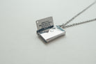 Envelope Locket necklace in a close-up jewellery view.