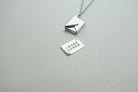 Personalised Envelope Locket necklace styled as a meaningful gift.