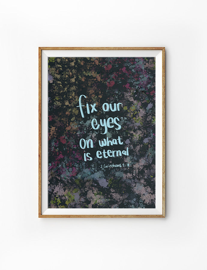 A framed artwork featuring the inspirational Bible verse "Fix our eyes on what is eternal" from 2 Corinthians 4:18, displayed on a colorful, abstract background with a handwritten-style font.