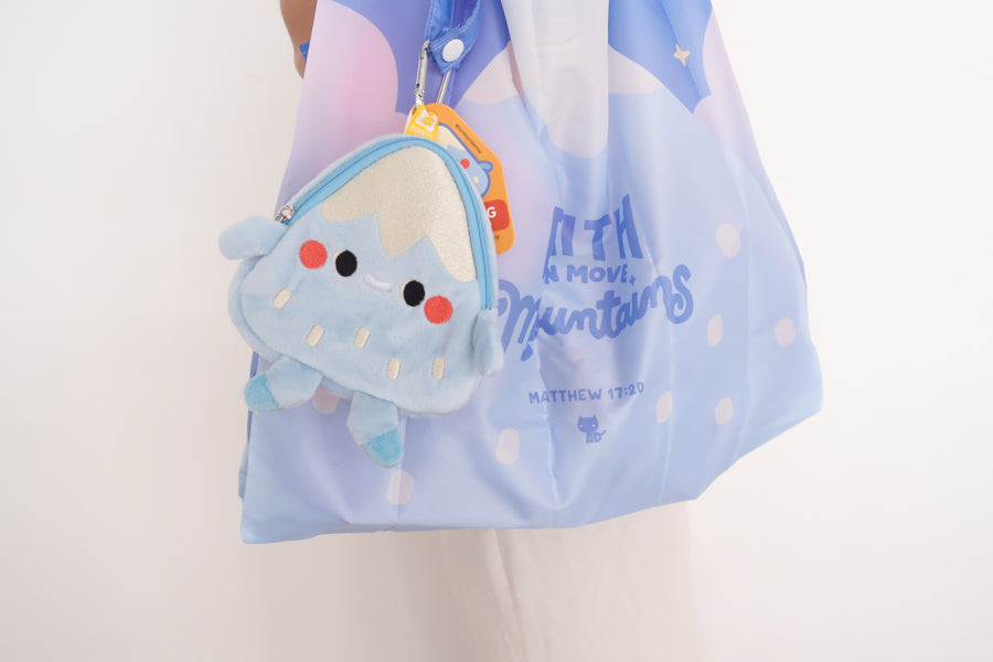 Christian foldable eco bag “Everest” in blue featuring “Faith can move mountains” Matthew 17:20 with attached plush pouch.