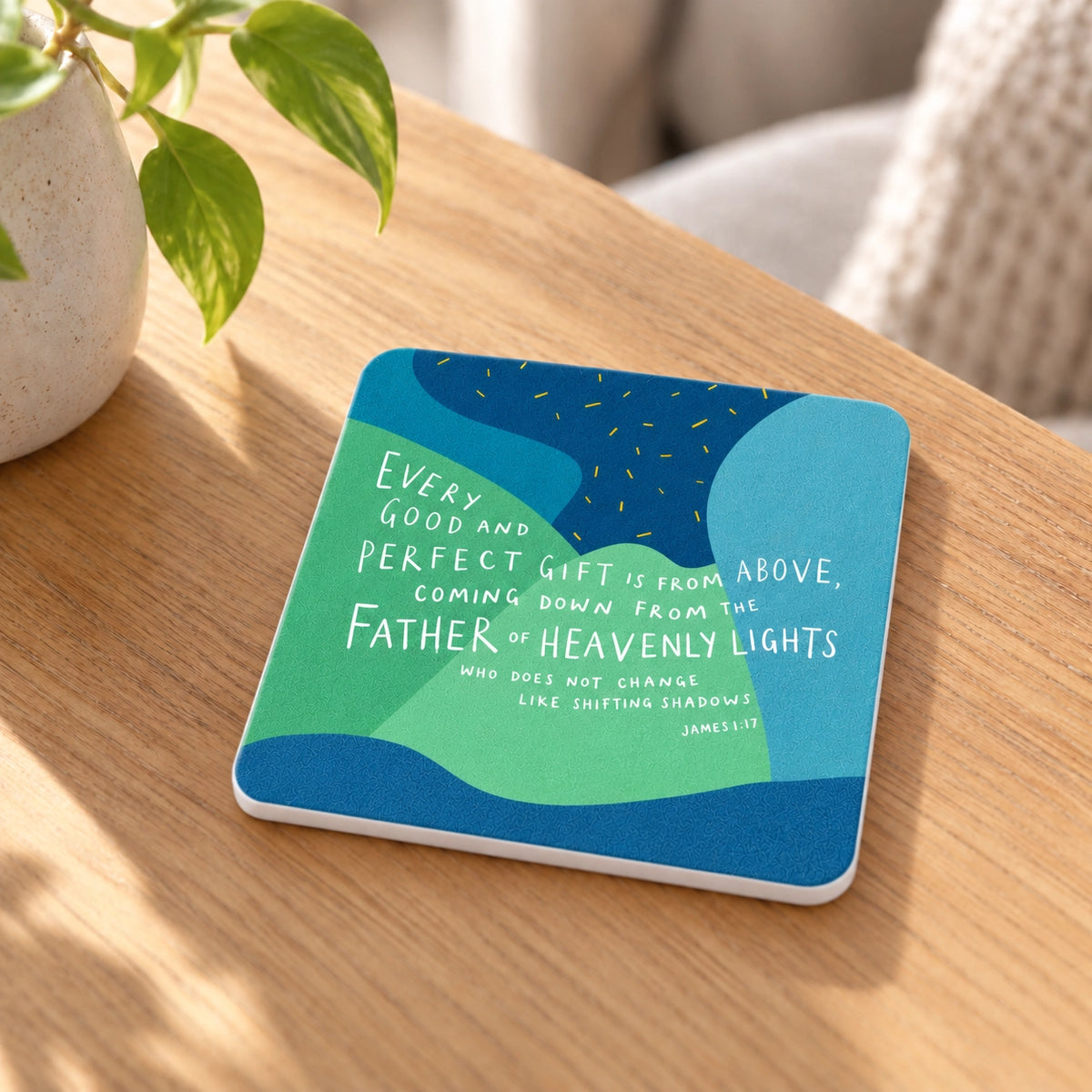 Every Good and Perfect Gift James 1:17 Christian coaster styled on a warm wooden side table with a white-edged coaster and soft natural light