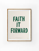 Faith It Forward Christian poster inspired by Matthew 5:16 in a natural wood frame on a white background